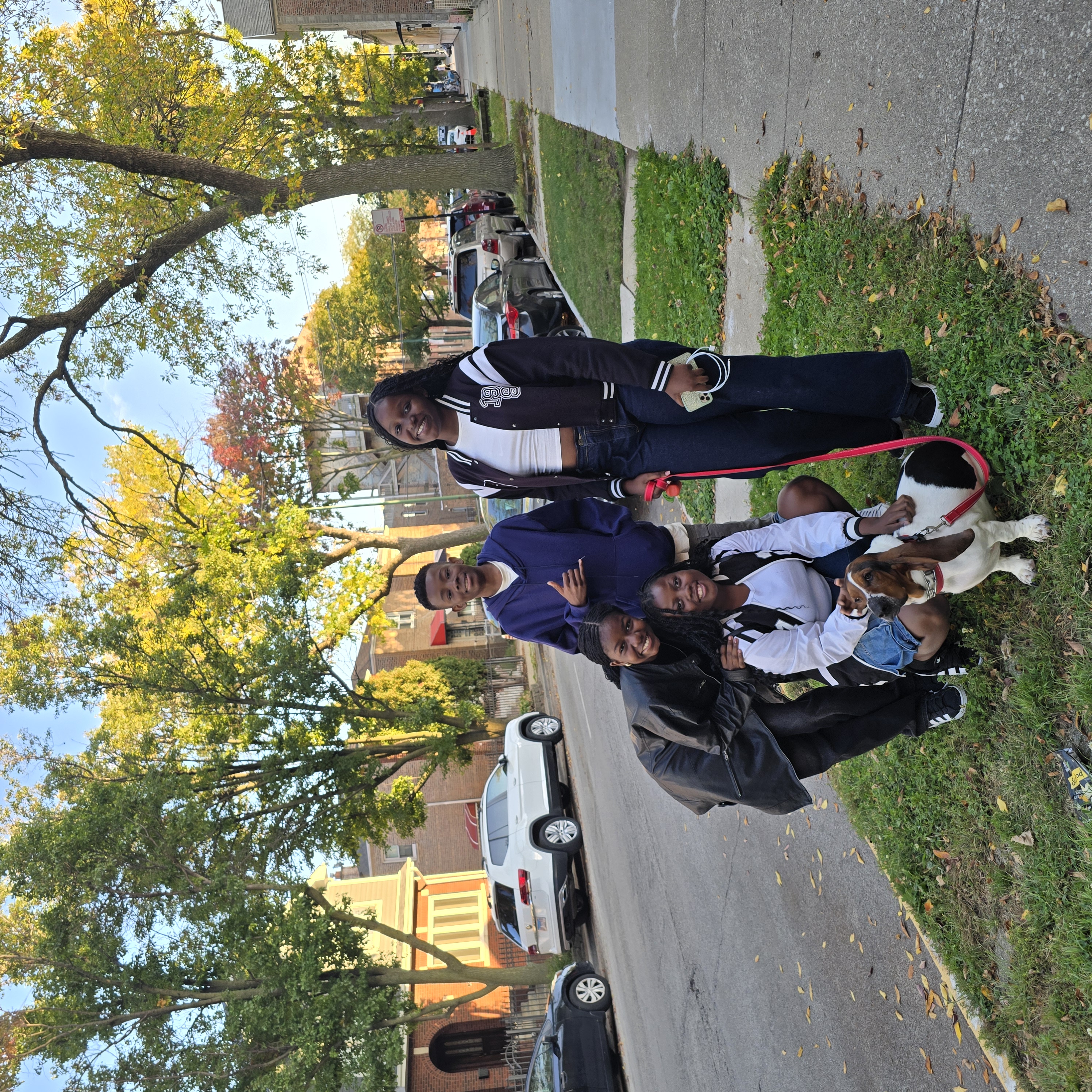 Visiting students from Mozambique in Chicago with Finn the dog