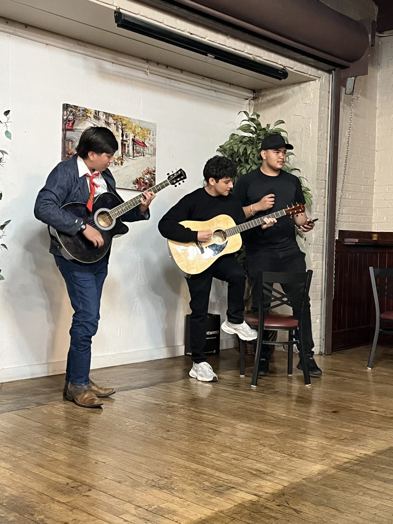 Three Durango students on guitars